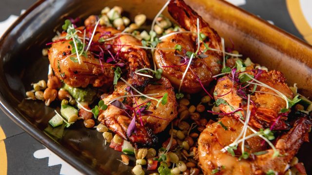 Premium tandoori grilled prawns from the gourmet seafood menu at Essence Kent.