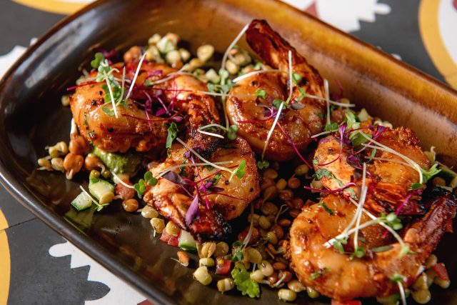 Premium tandoori grilled prawns from the gourmet seafood menu at Essence Kent.