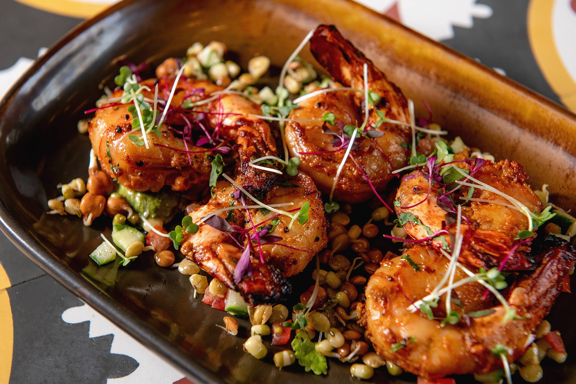 Premium tandoori grilled prawns from the gourmet seafood menu at Essence Kent.