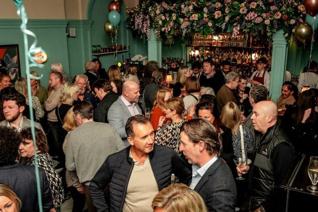 The vibrant, festive atmosphere inside the Grade II listed dining room at Essence at The Pantiles during its first anniversary party.