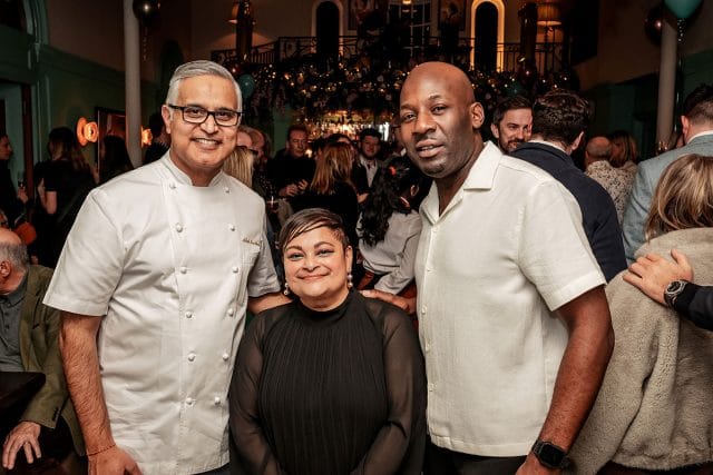 Delighted guests socialising and celebrating the one-year anniversary of Essence, a premium Indian fine dining restaurant in Kent.