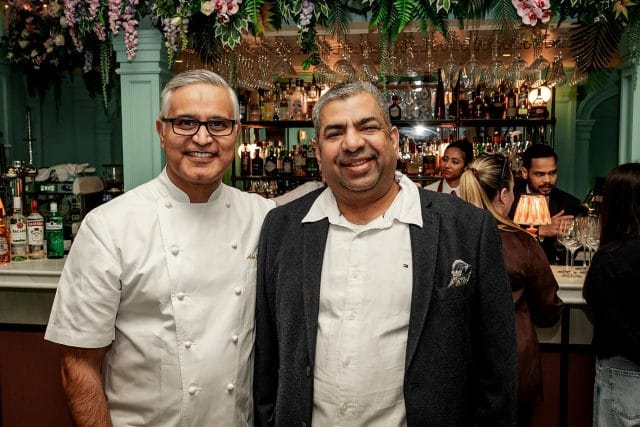 A beautifully decorated first-year anniversary celebration cake presented at Essence by Atul Kochhar in Royal Tunbridge Wells.