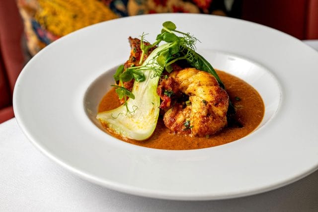 An elegant South Indian supper club dining experience featuring vibrant regional spices at Essence by Atul Kochhar in Tunbridge Wells.
