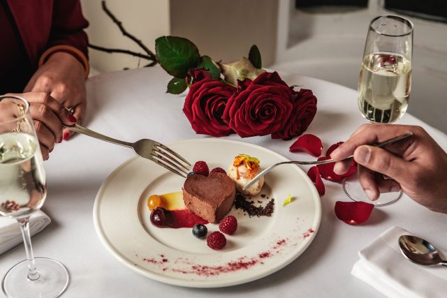 A romantic Valentine's Day fine dining table setting featuring authentic Indian cuisine at Essence by Atul Kochhar in Tunbridge Wells.