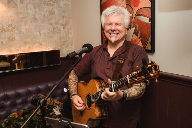 Resident musician Gordon Mark Webber performing acoustic live music at Essence Tunbridge Wells.